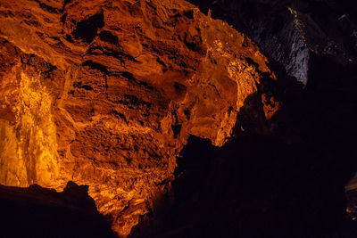 Scenic view of rock formation at night