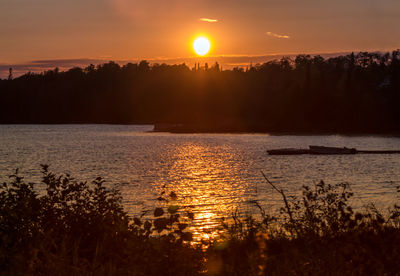 Scenic view of sea at sunset