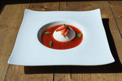 High angle view of strawberry served on table