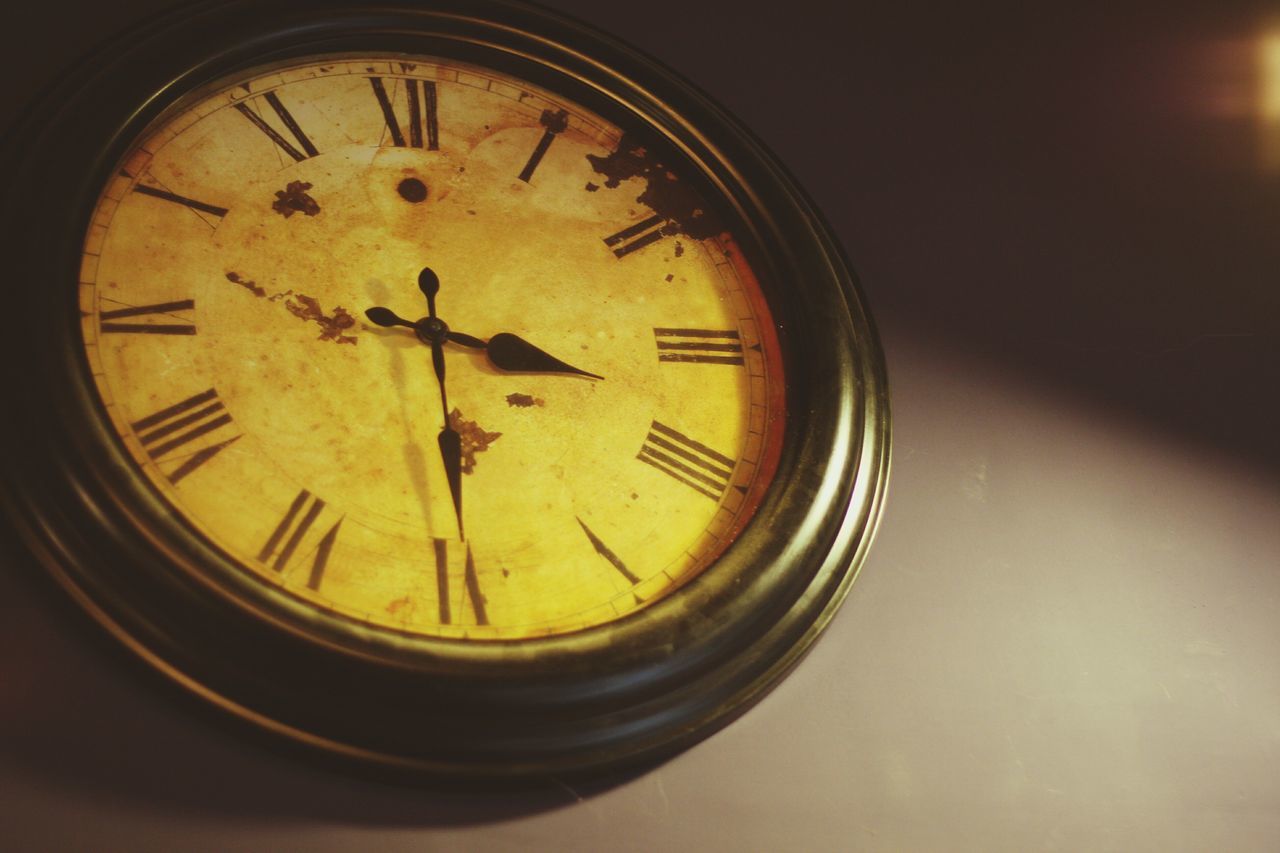 time, clock, close-up, indoors, number, circle, clock face, single object, text, communication, instrument of time, minute hand, accuracy, wall clock, focus on foreground, no people, glass - material, old-fashioned, selective focus, western script