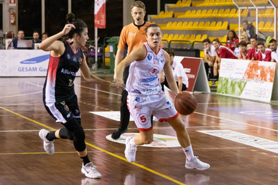 Group of people playing basketball