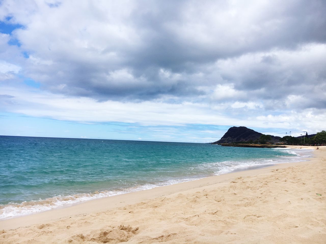 sea, beach, water, sky, scenics, tranquil scene, horizon over water, beauty in nature, tranquility, shore, cloud - sky, sand, cloudy, nature, coastline, cloud, idyllic, wave, surf, day