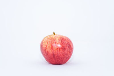 Close-up of apple against white background