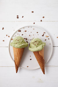 Directly above shot of ice cream in plate on table