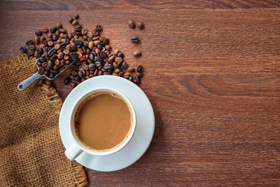 High angle view of coffee cup on table