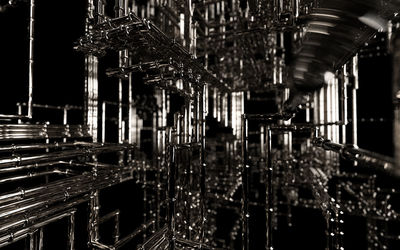 Panoramic shot of illuminated glass building at night