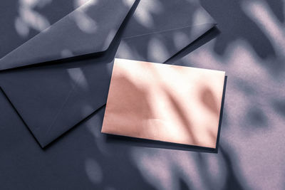 High angle view of paper on table