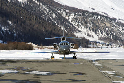 Front view of a private jet in the airport of engadin st moritz switzerland
