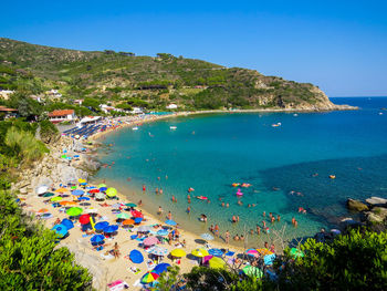 High angle view of beach against blue sky