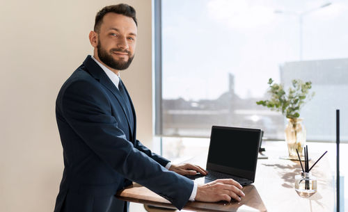 Portrait of businessman in office