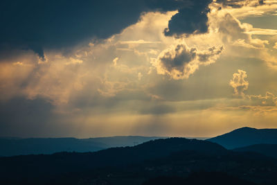 Scenic view of dramatic sky during sunset