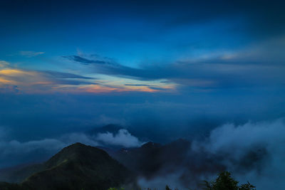 Low angle view of dramatic sky at sunset