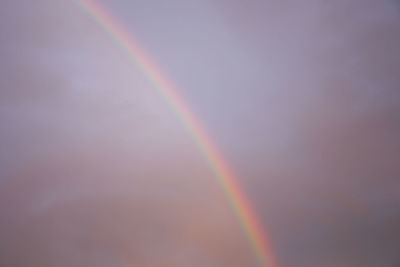 Low angle view of rainbow against sky