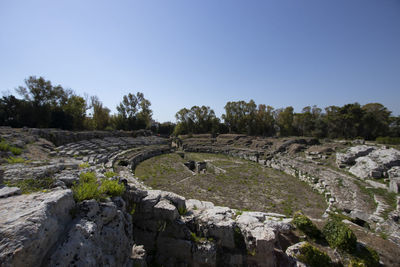 View of old roman theatre against clear sky