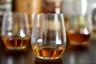 Close-up of beer glass on table