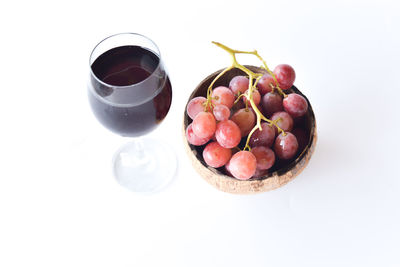 High angle view of grapes in glass on table