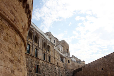 Low angle view of historical building against sky