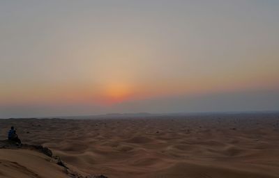 Scenic view of sea at sunset