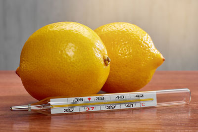 Close-up of oranges on table