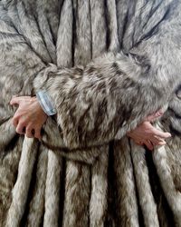 Midsection of person wearing fur jacket during winter