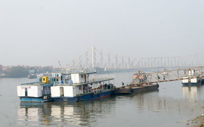 Ship in sea against clear sky