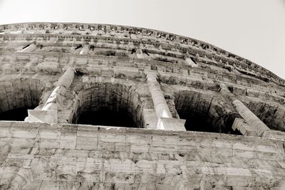 Low angle view of old ruins against clear sky