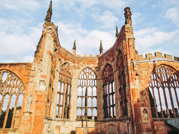 Low angle view of historic building against sky