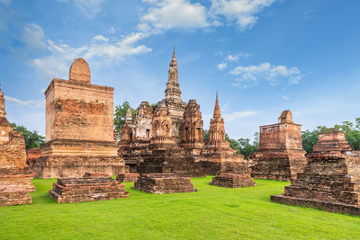 Old temple building against sky