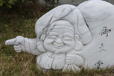 Close-up of angel statue in park