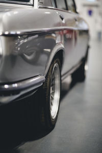 Close-up of vintage car on street