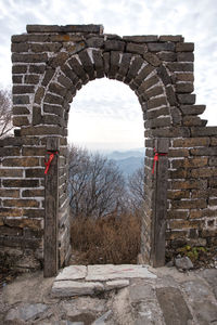 Stone wall against sky
