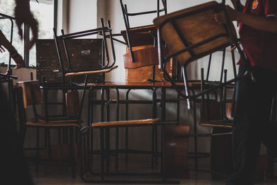 Empty chairs and table in cafe