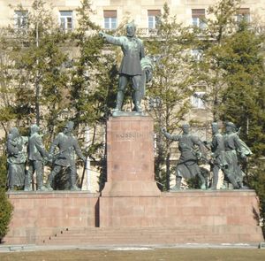 Low angle view of statue against trees