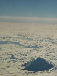 Scenic view of snow covered landscape