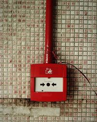 Close-up of text on brick wall