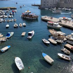 High angle view of boats in harbor