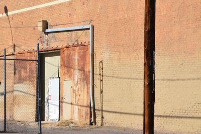 Built structure against brick wall