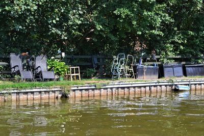 Swimming pool by lake in park