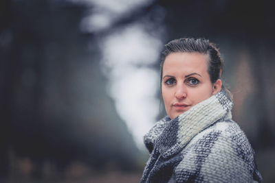 Portrait of a smiling woman in snow