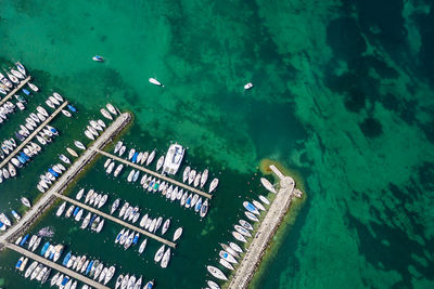 Aerial view of boats moored on sea