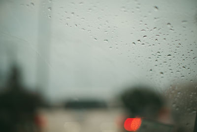 Close-up of raindrops on glass window