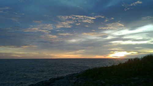 View of calm sea at sunset