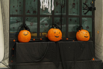 The front door of a house with halloween decorations.