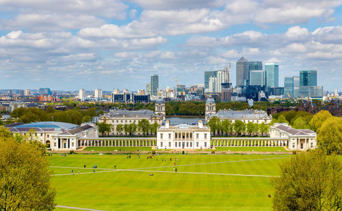 View of buildings against cloudy sky