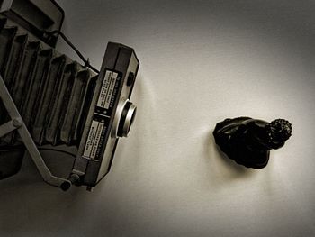 High angle view of telephone on table