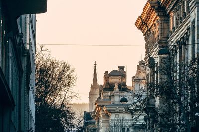 Low angle view of buildings against clear sky