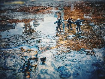 High angle view of wet puddle on rainy day