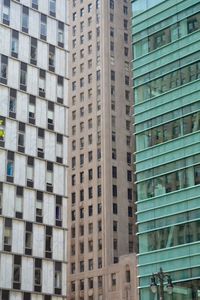 Low angle view of modern buildings in city