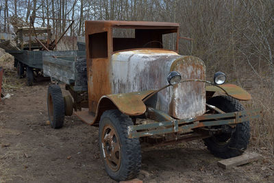 Old vintage car on field