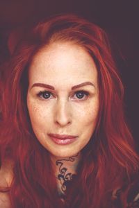 Close-up portrait of beautiful redhead woman